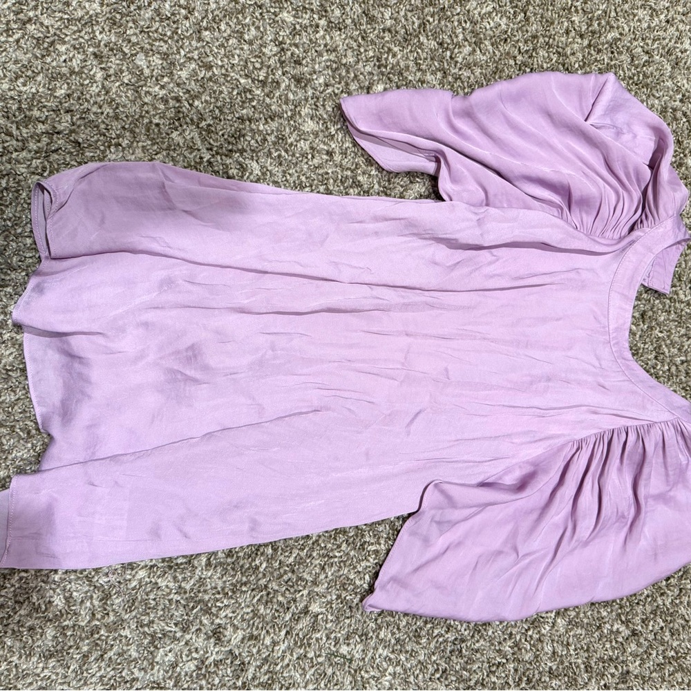 NWT. Naked Zebra top. Size medium. Lilac color.